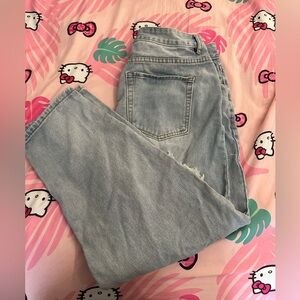 Light blue ripped jeans